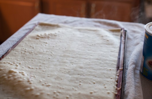 The steaming cake is placed on the counter.