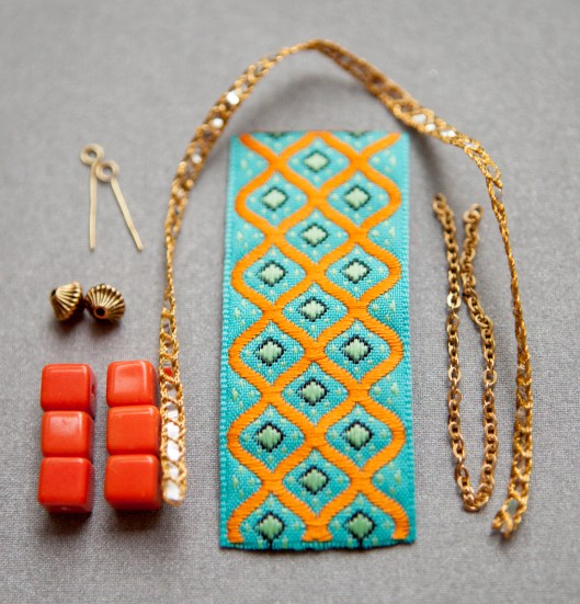 Tiny ribbon tote bag supplies: ribbon, chain, metallic trim, square beads, brass beads and eye pins.