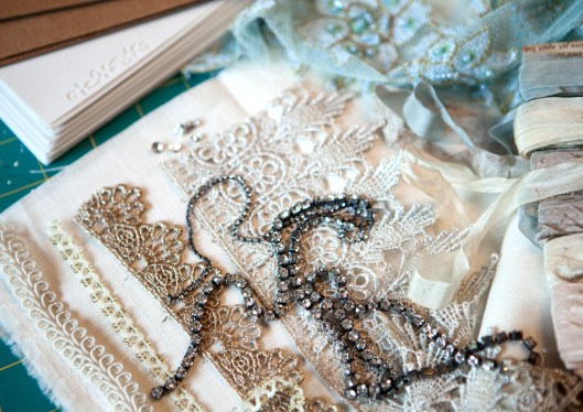 Glittery trims, lace and rhinestones to make a handmade journal.