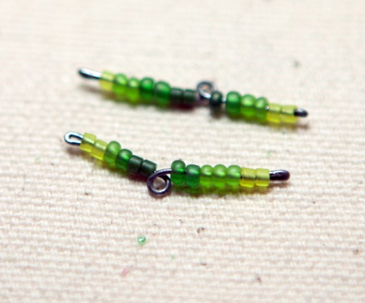 Two beaded wires ready to place on the flower wire.