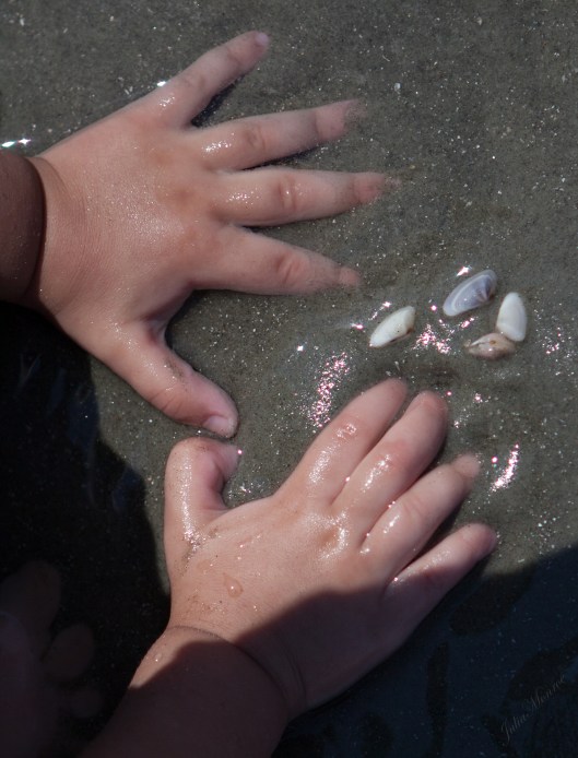 If you look close, you'll see nebula, milky way, stars and suns in the sand. 