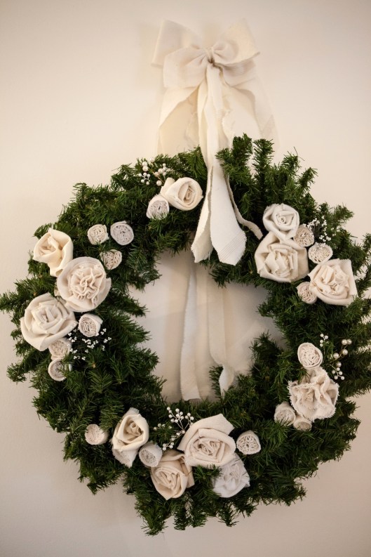 The flowers are made using the wool interlinings of men's ties.