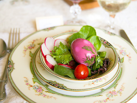 Pickled eggs add color to the salad dish.