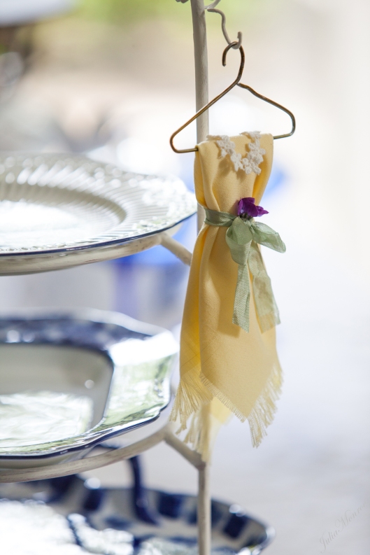 20 Fabric napkin folded to look like a dress on a hanger