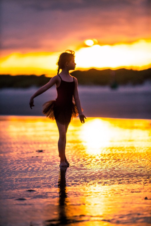 For just a moment, she stood in the sunset. 