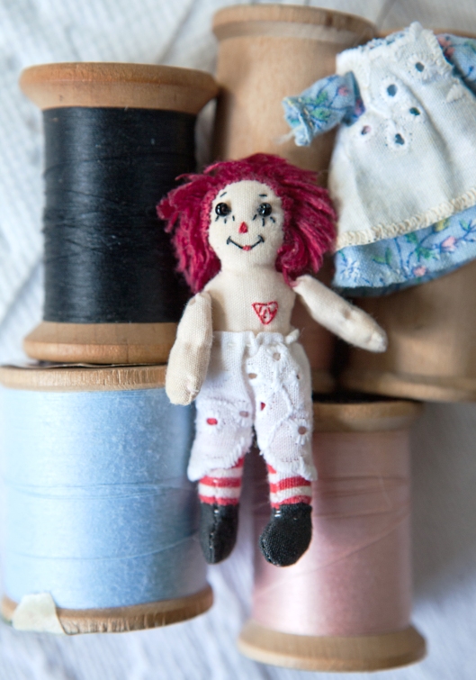 Tiny Raggedy Ann with her ILY heart